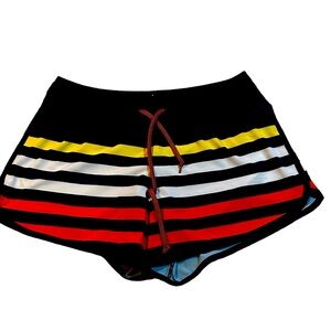 Run in rabbit Surf n Turf shorts. 4” inseam.